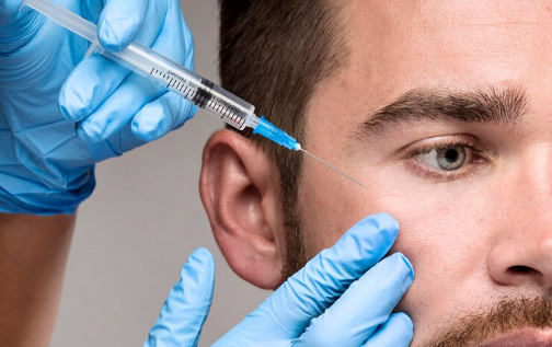 Man receiving Botox injection for aesthetic enhancement, focusing on facial rejuvenation and confidence-boosting treatments.