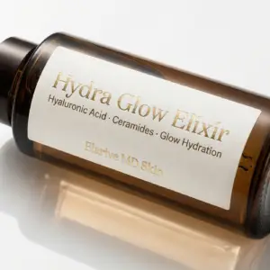 Hydra Glow Elixir bottle featuring hyaluronic acid and ceramides for enhanced hydration, part of Elarive MD Skin's premium skincare line at Prime Vitality.