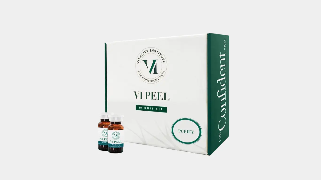 VI Peel kit featuring two vials labeled "Purify" alongside a box, highlighting medical-grade skincare solutions for melasma and acne scarring, emphasizing skin health and rejuvenation.