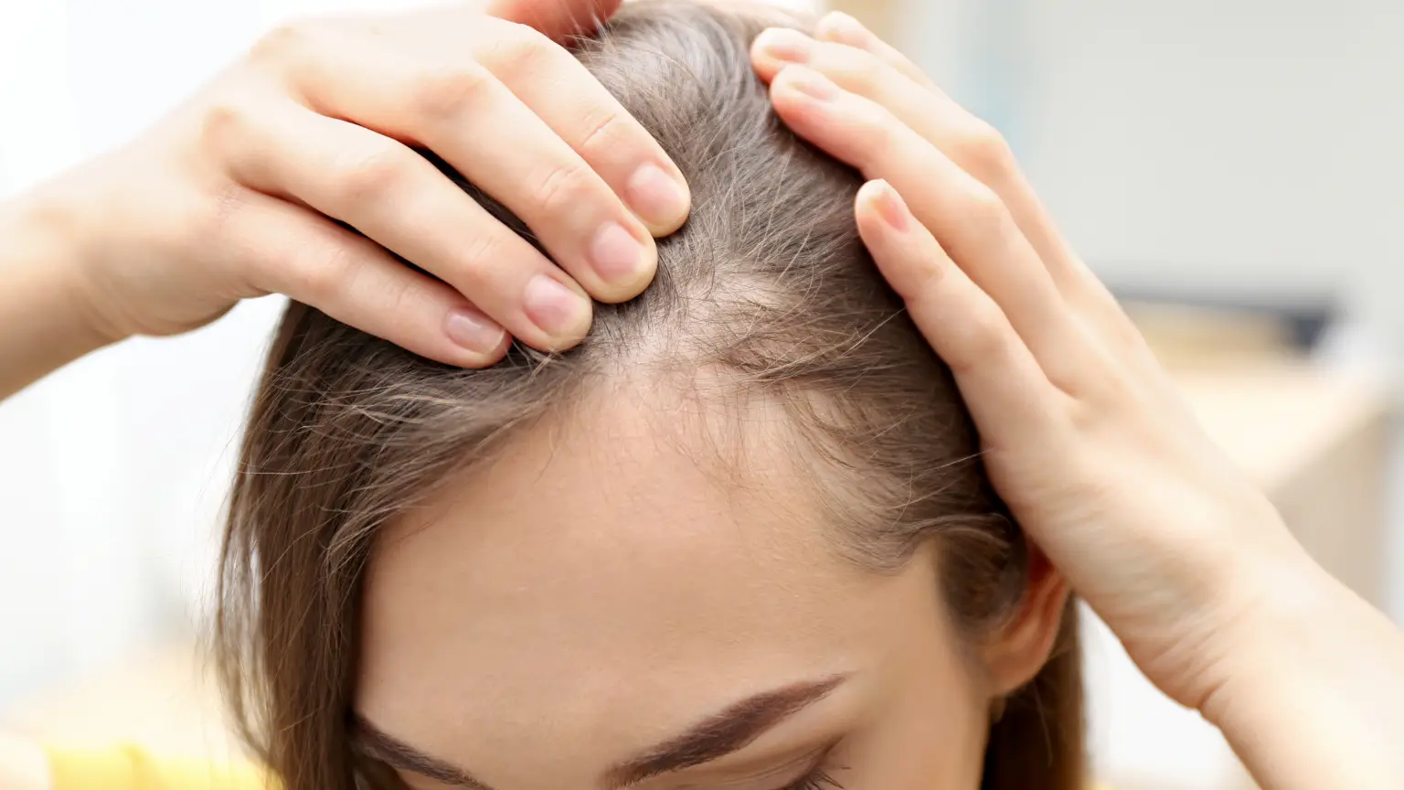 Prime Vitality hair restoration patient looking at fuller hair