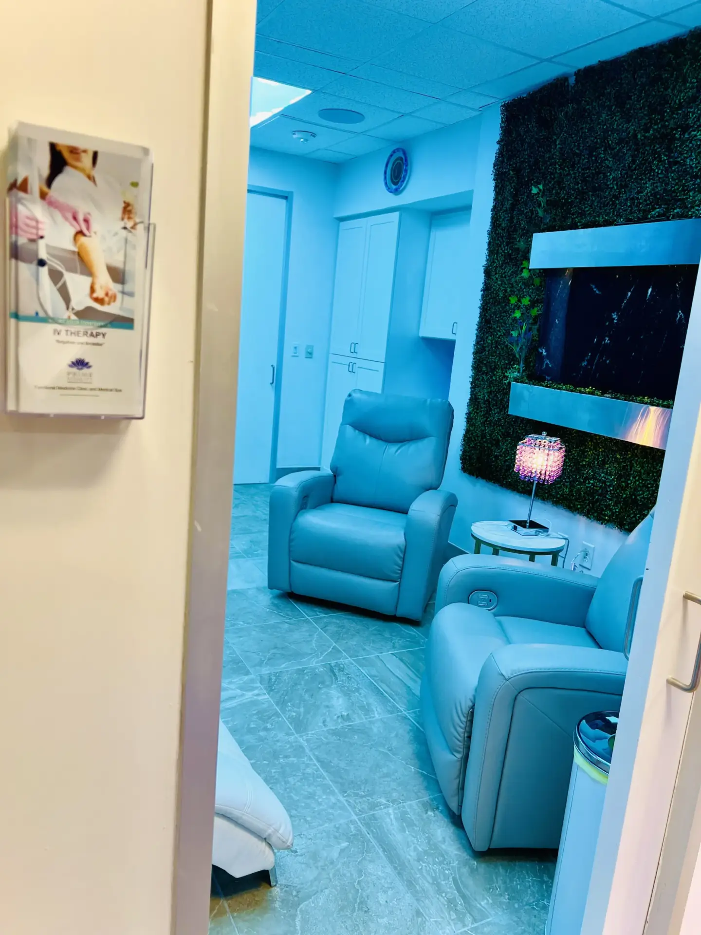 Patient receiving IV therapy for skin rejuvenation in a calming wellness environment